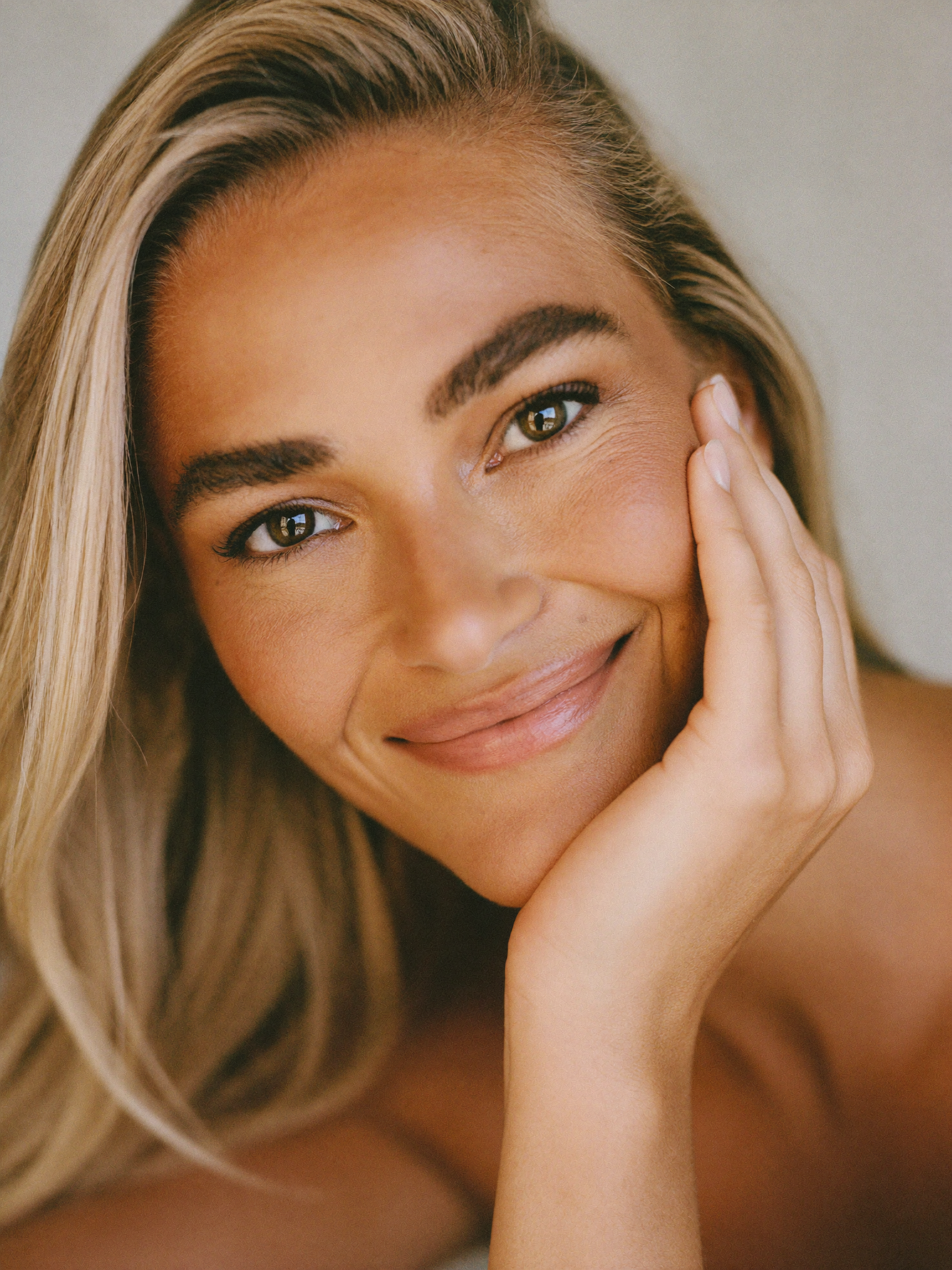 A naturally refreshed woman — still herself, only rested